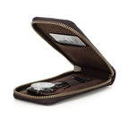 Single wristwatch stored inside a leather travel case